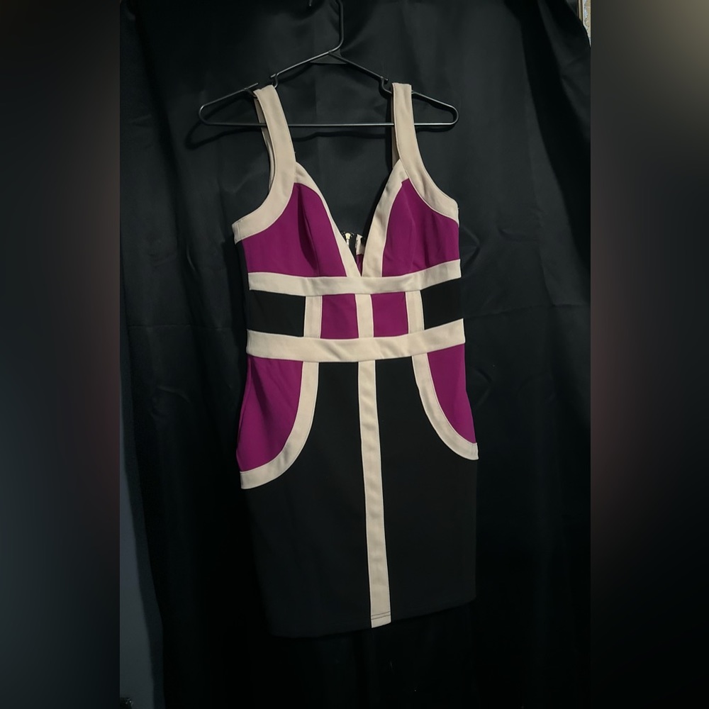 Entry dress. Worn Once. Cream , purple and black color.